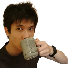 An East-Asian man, Zach himself, drinking a cup of coffee.